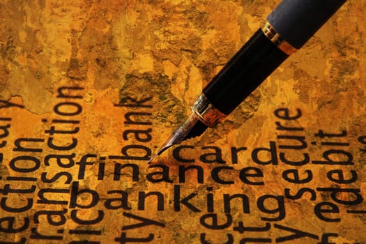 Fountain pen on finance and banking text
