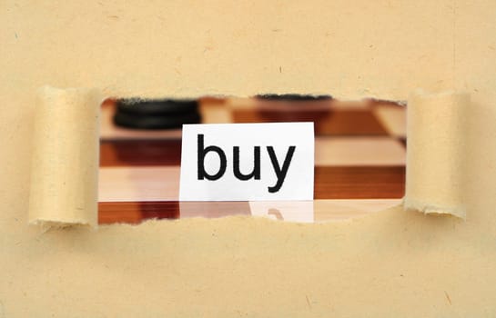 Buy tag on ripped paper