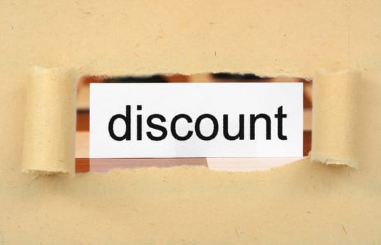 Discount tag on ripped paper