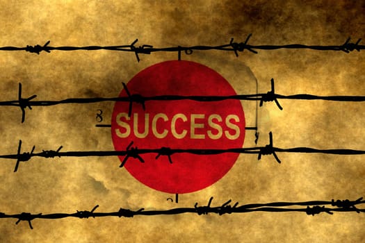Success concept against barbwire