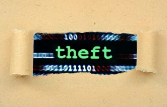 Theft text on ripped paper