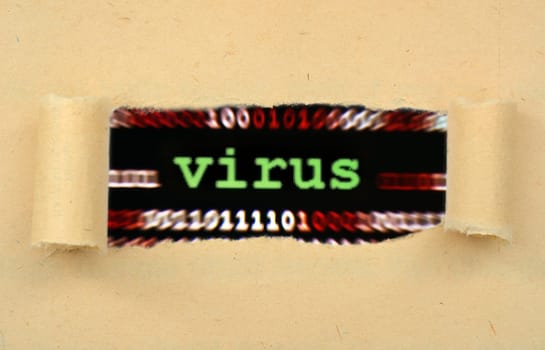 Virus concept on ripped paper