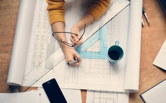 Top view of architect drawing on architectural project