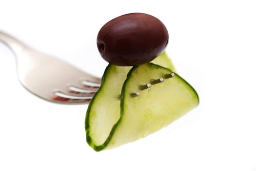Cucumber on fork