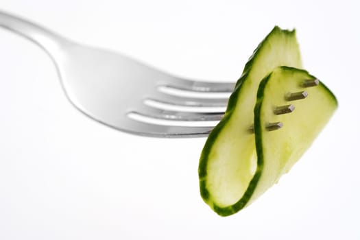 Cucumber on fork