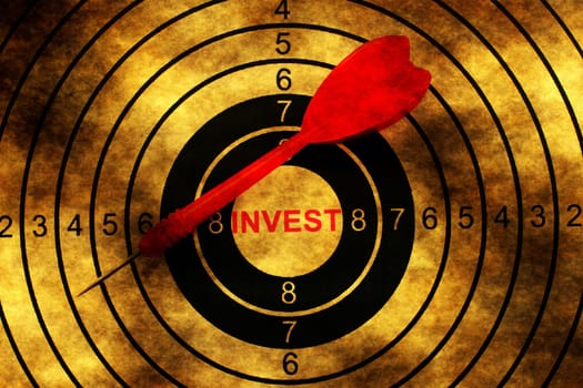 Invest target on grunge background