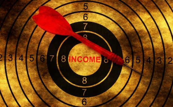 Income target on grunge background