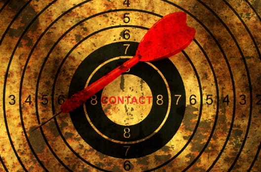 Dart on grunge contact target