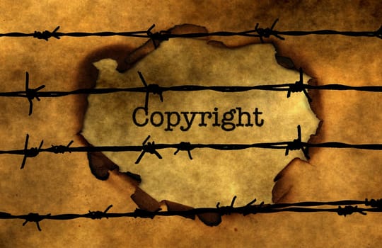 Copyright concept against barbwire