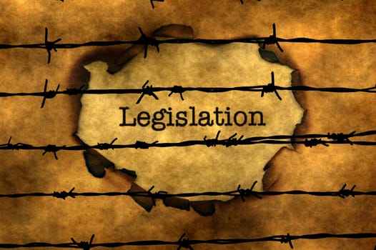 Legislation concept against barbwire