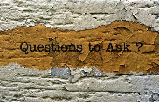 Questions to ask text on grunge background