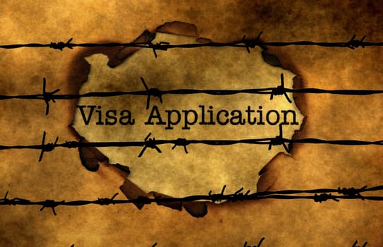 Visa application concept against barbwire