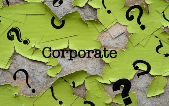 Corporate text and question mark