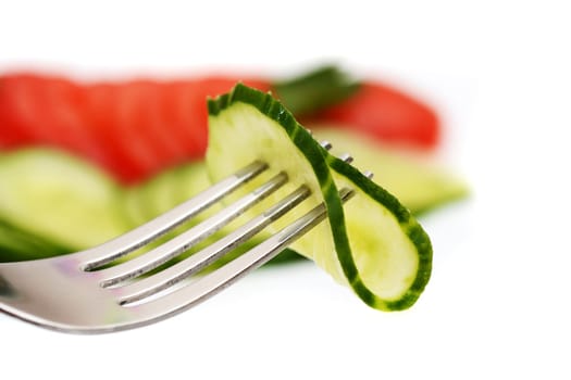 Cucumber slice on fork