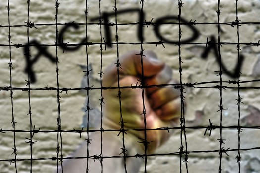 Action hand and Barbwire concept
