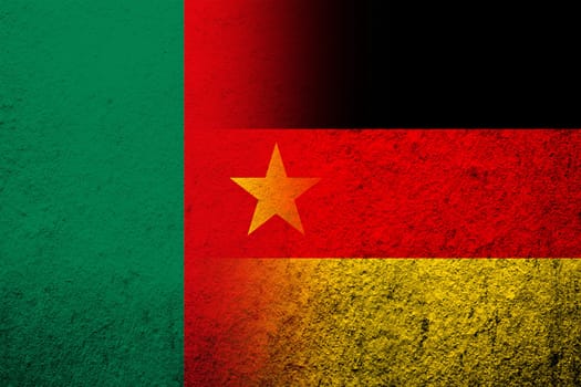 The national flag of Germany with Cameroon National flag. Grunge background