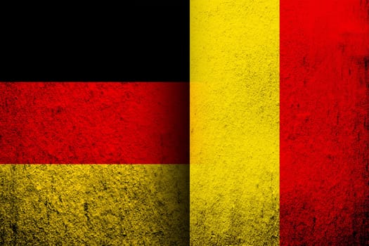 The national flag of Germany with Kingdom of Belgium National flag. Grunge background