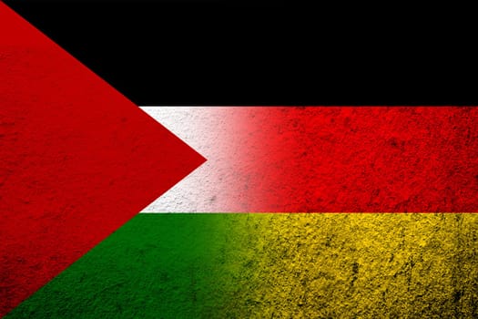 The national flag of Germany with Flag of Palestine. Grunge background
