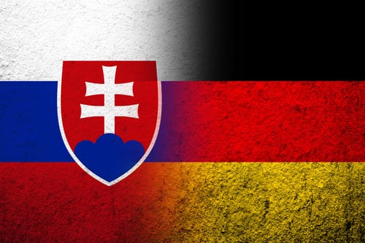 The national flag of Germany with National flag of Slovakia. Grunge background