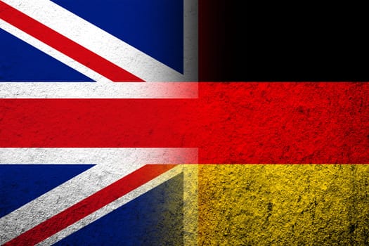 The national flag of Germany with National flag of United Kingdom Great Britain. Grunge background