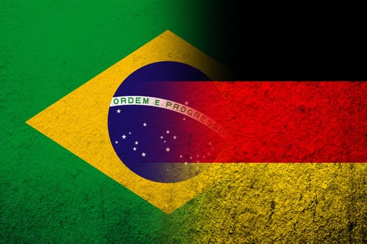 The national flag of Germany with National flag of Brazil. Grunge background