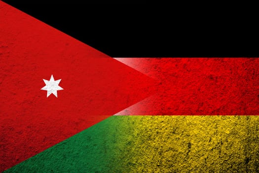 The national flag of Germany with Kingdom of Jordan National flag. Grunge background