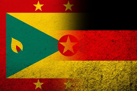 The national flag of Germany with National flag of Grenada. Grunge background