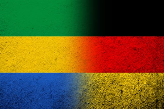 The national flag of Germany with National flag of Gabon. Grunge background