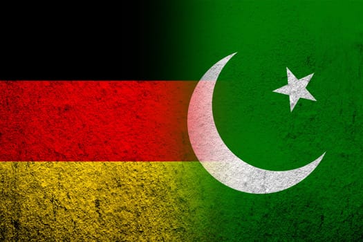 The national flag of Germany with Republic of Pakistan National flag. Grunge background