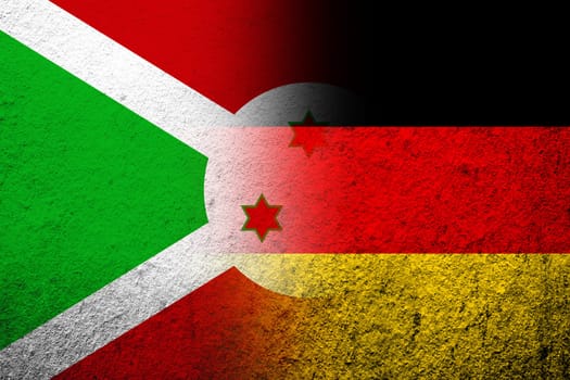 The national flag of Germany with The Republic of Burundi National flag. Grunge background