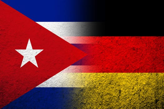 The national flag of Germany with The Republic of Cuba National flag. Grunge background