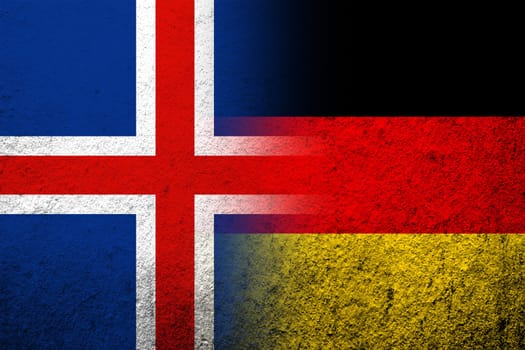 The national flag of Germany with National flag of Iceland. Grunge background