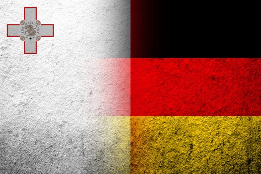 The national flag of Germany with The Republic of Malta National flag. Grunge background