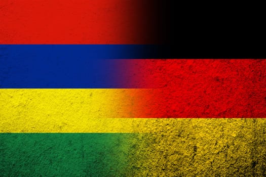 The national flag of Germany with The Republic of Mauritius National flag. Grunge background