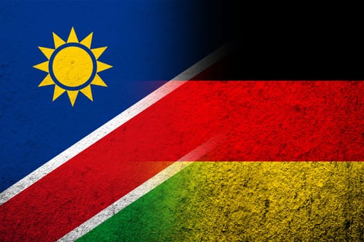 The national flag of Germany with The Republic of Namibia National flag. Grunge background
