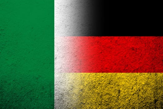 The national flag of Germany with Nigeria National flag. Grunge background
