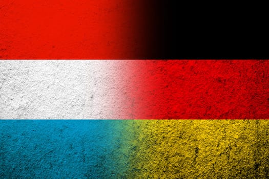 The national flag of Germany with The Grand Duchy of Luxembourg National flag. Grunge background