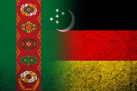 The national flag of Germany with The Republic of Turkmenistan National flag. Grunge background