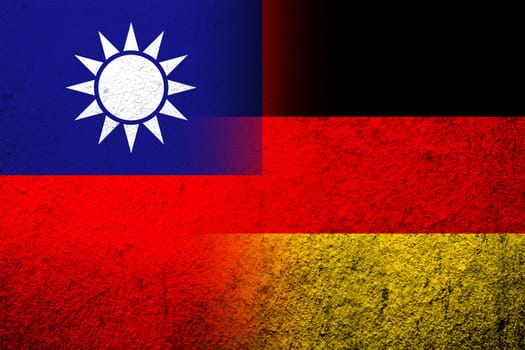 The national flag of Germany with Taiwan National flag. Grunge background