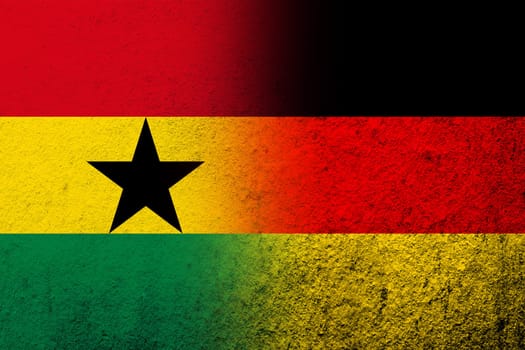 The national flag of Germany with The Republic of Ghana National flag. Grunge background