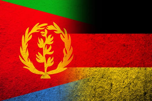The national flag of Germany with The State of Eritrea national flag. Grunge background