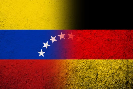 The national flag of Germany with The Bolivarian Republic of Venezuela National flag. Grunge background