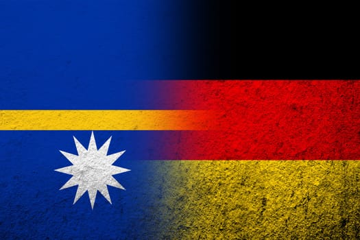 The national flag of Germany with The Republic of Nauru Pleasant Island National flag. Grunge background