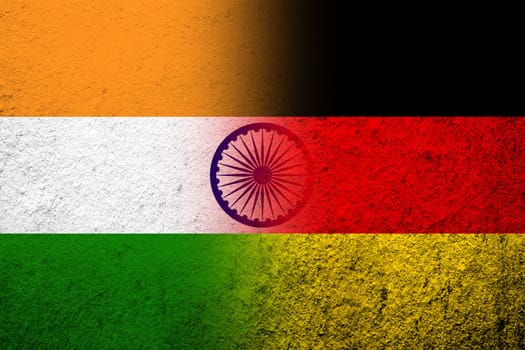 The national flag of Germany with The Republic of India National flag. Grunge background