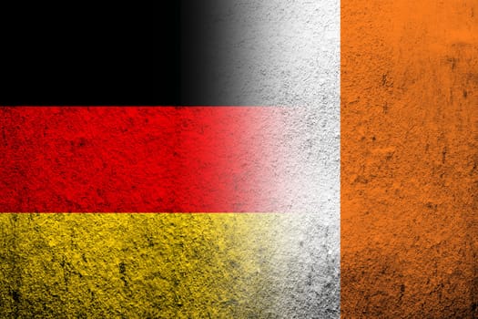 The national flag of Germany with The Republic of Ireland National flag. Grunge background
