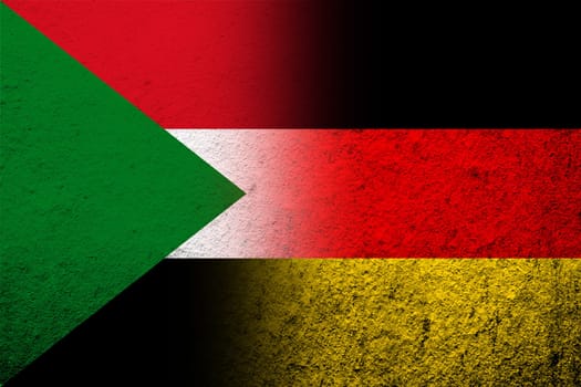 The national flag of Germany with the Republic of the Sudan National flag. Grunge background