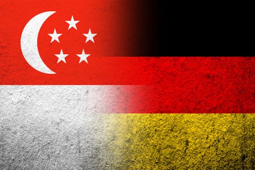 The national flag of Germany with the Republic of Singapore National flag. Grunge background