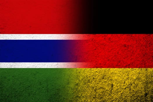 The national flag of Germany with The Republic of The Gambia National flag. Grunge background