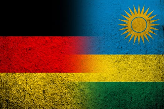The national flag of Germany with the Republic of Rwanda National flag. Grunge background