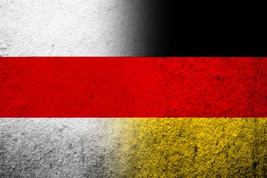 The national flag of Germany with White-red-white flag of Belarusian Democratic Republic, Belarus. Grunge background